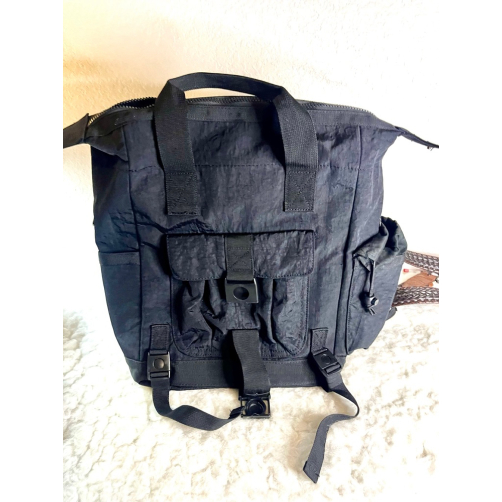 The Tommy Bahama 16” Black Nylon Square Convertible Backpack Bag